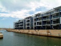 Dolphin Quay Apartment Hotel - Accommodation Airlie Beach