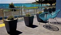 Penguin Beachfront Apartments - Accommodation Airlie Beach