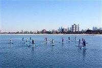 Stand-Up Paddle Board Group Lesson at St Kilda - eAccommodation