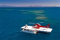 Scenic Helicopter Flight to Moore Reef and Return Snorkeling Cruise from Cairns - Accommodation Whitsundays