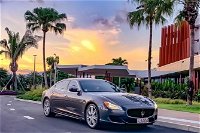 Maserati Quattroporte Limousine Transfer Cairns Airport to City - C Tourism