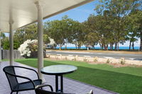 Large family waterfront home with room for a boat - Welsby Pde Bongaree - Seniors Australia