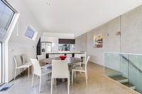 Nautilus 2 Luxury Retreat - Modern beachfront townhouse WiFi water views - Click Find