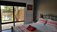 Red Ochre - Large 1BR with Private Courtyard - Click Find