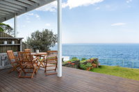 Unbelievable Clifftop Townhouse with Ocean Views - Click Find
