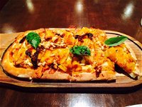 four hands pizza bar  grill - Local Tourism