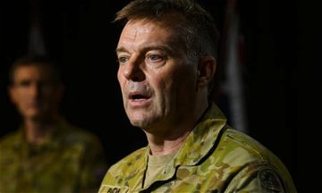 Australian defence force members warned they face prosecution if they plant weapons on people killed in combat