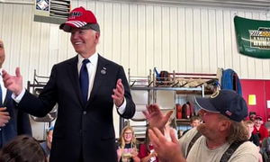 Biden jokes as he puts on Republicanâ€™s Trump 2024 cap: â€˜I need that hatâ€™