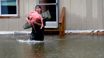 Catastrophic flooding swamped Vermont's capital as intense storms forced evacuations, rescues and closures in the Northeast