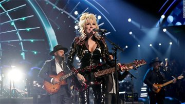 Dolly Parton jokes she'll 'hopefully drop dead in the middle of a song' someday before she ever retires