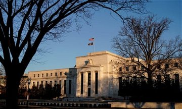 Fed announces smallest interest hike in a year as inflation ‘eases somewhat’