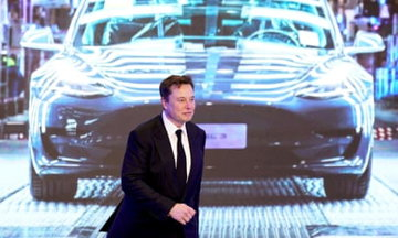 Musk unveils plans for low production cost while skirting affordable car option