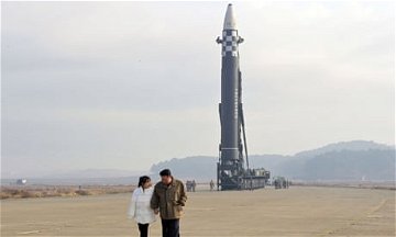North Korean leader Kim Jong-un reveals daughter at ballistic missile test