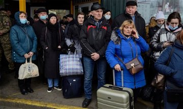 Stay or flee? Kyiv comes to terms with disaster of Russian invasion