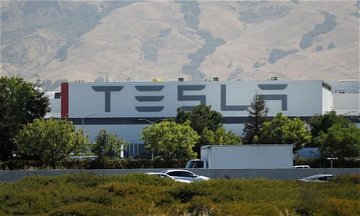 Tesla fires more than 30 workers after union drive announcement