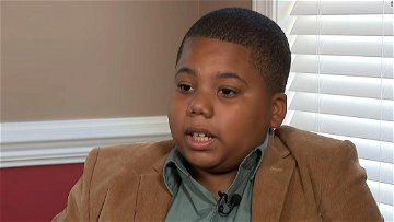The 11-year-old boy shot in the chest by Mississippi police after calling 911 says he prayed and sang to stay alive. He wants the officer fired