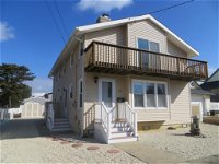 Brant Beach Oceanside home with a short walk to the beach. Get a peek of the Ocean/Bay views fro the Master bedroom deck. Large 