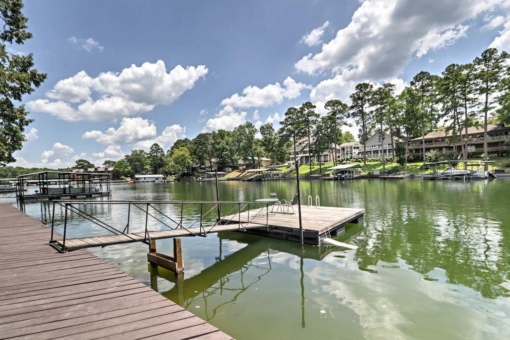 Cute Lakefront Hot Springs Condo with Balcony and Dock Orlando Tourists