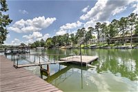Cute Lakefront Hot Springs Condo with Balcony and Dock