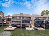 Lake LBJ Waterfront Townhouse with Private Boat Slip and Steps from HSB Resort