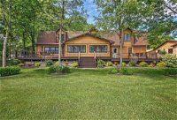 Large Home on Lake Edward with Deck  Fire Pit