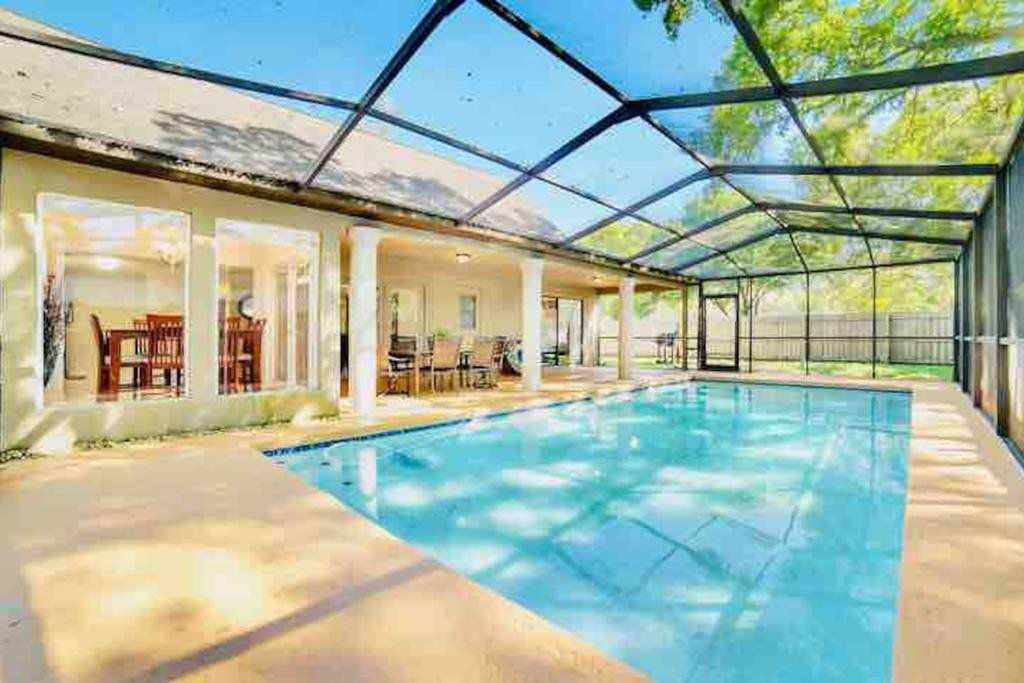 Tampa Hotspot Heated Private Pool with Game Rooms In Quiet Neighborhood Near USF Busch Garden Adventure Island additional co Orlando Tourists