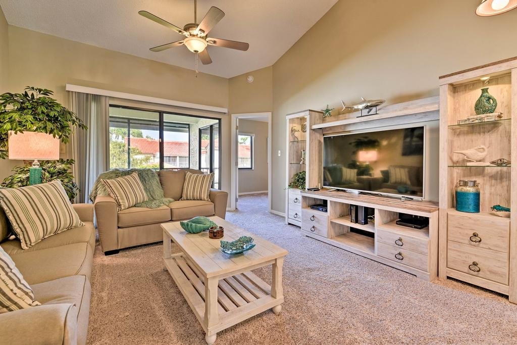 Titusville Condo with Comm Pool and Screened Patio Orlando Tourists