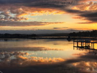 Reflections on Merimbula Lake - Darwin Tourism