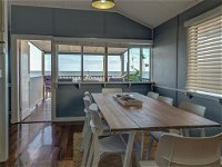 Sublime Beachfront Queenslander on the Esplanade - Accommodation Search
