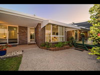 Woorim Secluded Palms Cottage - Accommodation QLD