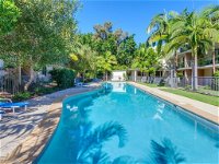 Baden 70 - Rainbow Shores Ground Floor Air Con Overlooking lap pool - Accommodation Airlie Beach